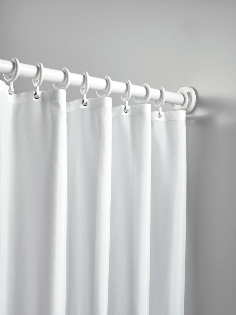 Shower curtain on a shower rail white