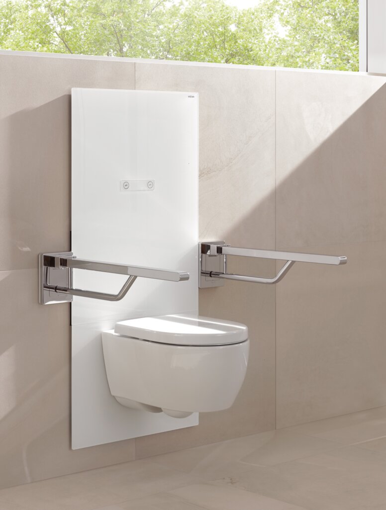 Height-adjustable WC module with folding support handle